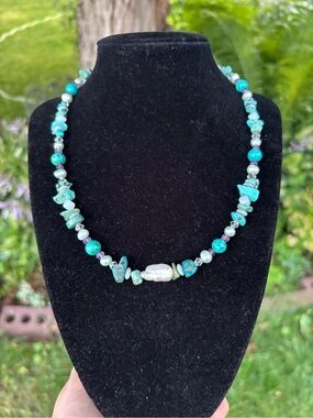 Turquoise pearl necklace.